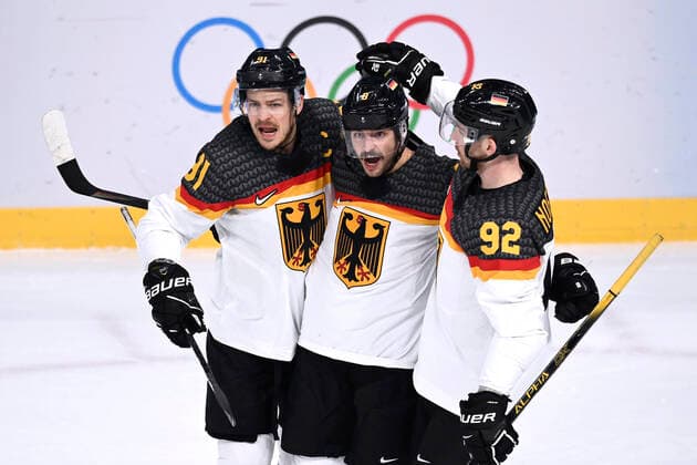 RIEDER Tobias Team GER Jubel mit Kapitaen MUELLER Moritz und NOEBELS Marcel Eishockey Spiel Vorrunde Kanada - Deutschland am Donnerstag den 10.02.2022 in Beijing Olympische Winterspiele 2022 in Peking China