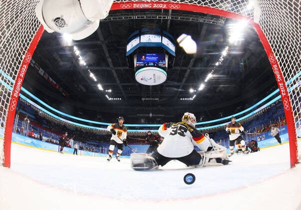 (220210) -- BEIJING, Feb. 10, 2022 -- Goalkeeper Mathias Niederberger (front) of Germany misses a goal during Ice hockey, Eishockey men s Group A match between Canada and Germany at Wukesong Sports Centre in Beijing, capital of China, Feb. 10, 2022. Song Yanhua) (BEIJING2022)CHINA-BEIJING-OLYMPIC Winter games, Winterspiele,Spiele, Summer games ICE HOCKEY-MEN S PRELIMINARY-CANADA VS GERMANY (CN) RemotexCamera 