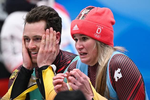 China Olympics 2022 Luge Team Relay 8110784 10.02.2022 Germany s Natalie Geisenberger and Johannes Ludwig react after winning the gold medals in the luge team relay competition during the Beijing 2022 Winter Olympic Games, Olympische Spiele, Olympia, OS at the National Sliding Centre in Yanqing, China. Vladimir Astapkovich Sputnik Beijing China  Copyright: xVladimirxAstapkovichx