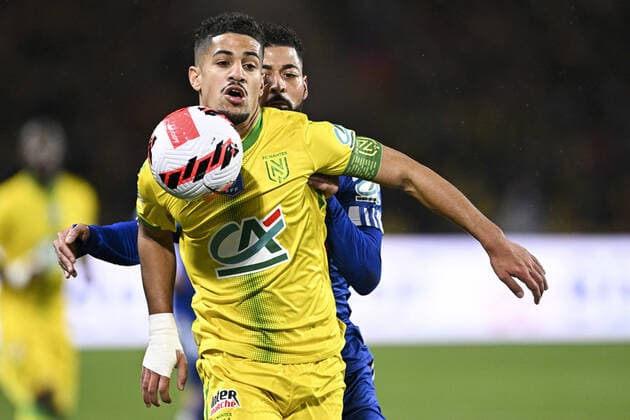 Ludovic Blas (Nantes) vs Lloyd Palun (Bastia) FOOTBALL : FC Nantes vs SC Bastia - Coupe de France - 10 02 2022 JBAutissier Panoramic 
