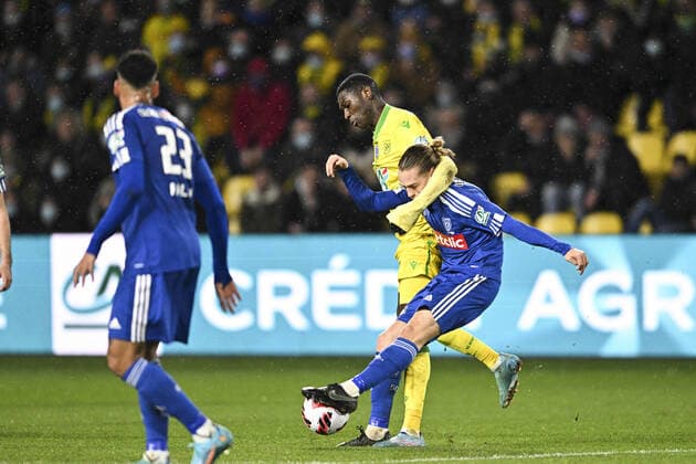 Randal Kolo Muani (Nantes) vs Tom Ducrocq (Bastia) FOOTBALL : FC Nantes vs SC Bastia - Coupe de France - 10 02 2022 JBAutissier Panoramic 