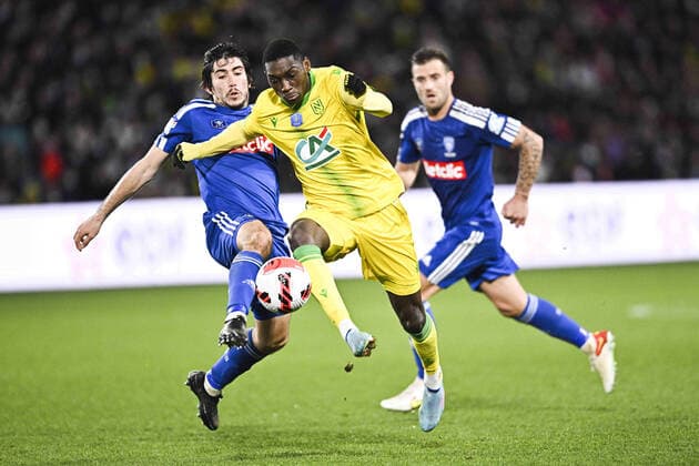 Fußball, Coupe de France, FC Nantes - SC Bastia Randal Kolo Muani (Nantes) vs Dominique Guidi (Bastia) FOOTBALL : FC Nantes vs SC Bastia - Coupe de France - 10 02 2022 JBAutissier Panoramic 
