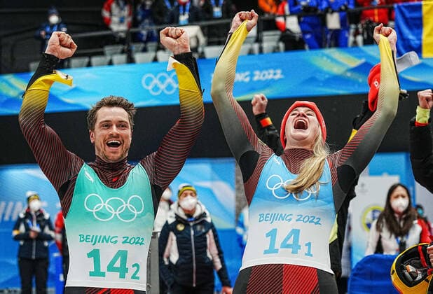 (220210) -- BEIJING, Feb. 10, 2022 -- Natalie Geisenberger (R) and Johannes Ludwig of Germany react druing the luge team relay competition at the Yanqing National Sliding Centre in Yanqing district of Beijing, capital of China, Feb. 10, 2022. ) (BEIJING2022)CHINA-BEIJING-YANQING-OLYMPIC Winter games, Winterspiele,Spiele, Summer games LUGE-TEAM RELAY (CN) JiangxWenyao 