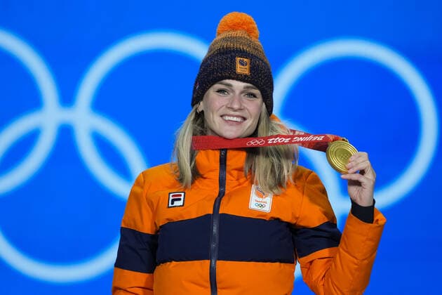 Irene Schouten of the Netherland s smiles with her gold medal during a medals ceremony for the Women s Speed skating, Eisschnelllauf 5000m race at the Beijing 2022 Winter Olympics on Friday, February 11, 2022.  OLY20220211283 PaulxHanna