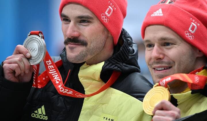 China Olympics 2022 Medal Ceremony 8111668 11.02.2022 Silver medalist Germany s Axel Jungk and gold medalist Germany s Christopher Grotheer pose during the medal ceremony for the men s skeleton event of the Beijing 2022 Winter Olympic Games, Olympische Spiele, Olympia, OS at the National Sliding Centre in Yanqing, China. Vladimir Astapkovich Sputnik Yanqing China  Copyright: xVladimirxAstapkovichx