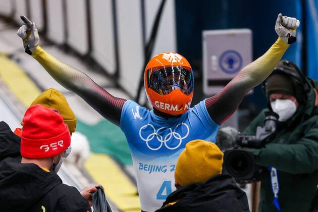 BEIJING, CHINA - FEBRUARY 11, 2022: Christopher Grotheer of Germany reacts at the finish of the men s skeleton event at the 2022 Winter Olympics at the Yanqing National Sliding Centre. Anton Novoderezhkin TASS  TS12289B