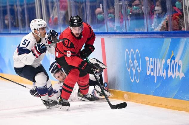China Olympics 2022 Ice hockey, Eishockey Men Canada - US 8111976 12.02.2022 Canada s Jordan Weal is challenged by Andy Miele, of the United States, in the men s ice hockey preliminary round group A match between Canada and the United States during the Beijing 2022 Winter Olympic Games, Olympische Spiele, Olympia, OS at National Indoor Stadium in Beijing, China. Alexey Filippov Sputnik Beijing China  Copyright: xAlexeyxFilippovx