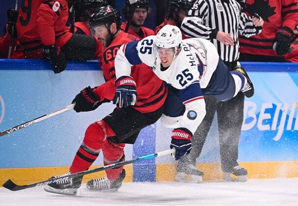 China Olympics 2022 Ice hockey, Eishockey Men Canada - US 8111966 12.02.2022 Marc McLaughlin, of the United States, falls after colliding with Canada s Jason Demers in the men s ice hockey preliminary round group A match between Canada and the United States during the Beijing 2022 Winter Olympic Games, Olympische Spiele, Olympia, OS at National Indoor Stadium in Beijing, China. Alexey Filippov Sputnik Beijing China  Copyright: xAlexeyxFilippovx