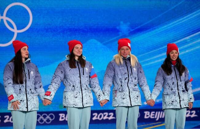 China Olympics 2022 Medal Ceremony 8112386 12.02.2022 Gold medalists Russian Olympic Committee s Yulia Stupak, Natalia Nepryaeva, Tatiana Sorina and Veronika Stepanova celebrate during the medal ceremony for the women s cross-country 4x5 km relay event during the Beijing 2022 Winter Olympic Games, Olympische Spiele, Olympia, OS at the Medals Plaza in Zhangjiakou, China. Ramil Sitdikov Sputnik Beijing China  Copyright: xRamilxSitdikovx