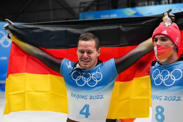 BEIJING, CHINA - FEBRUARY 11: Christopher Grotheer (L) and Axel Jungk (R) of Team Germany react after winning gold and silver respectively during the Men s Skeleton Heat 4 on day seven of Beijing 2022 Winter Olympic Games, Olympische Spiele, Olympia, OS at National Sliding Centre on February 11, 2022 in Beijing, China.  Copyright: xVCGx CFP111368813720 
