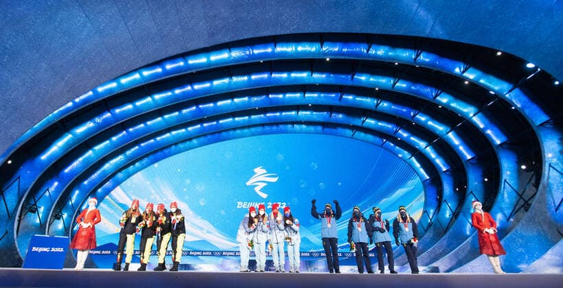 (220212) -- ZHANGJIAKOU, Feb. 12, 2022 -- Gold medalists of team ROC (C), silver medalists of team Germany (L) and bronze medalists of team Sweden celebrate during the awarding ceremony of cross-country skiing women s 4 x 5km relay at Zhangjiakou Medals Plaza of the Winter Olympics in Zhangjiakou, north China s Hebei Province, Feb. 12, 2022. ) (BEIJING2022)CHINA-ZHANGJIAKOU-OLYMPIC Winter games, Winterspiele,Spiele, Summer games AWARDING CEREMONY (CN) XiaoxYijiu 