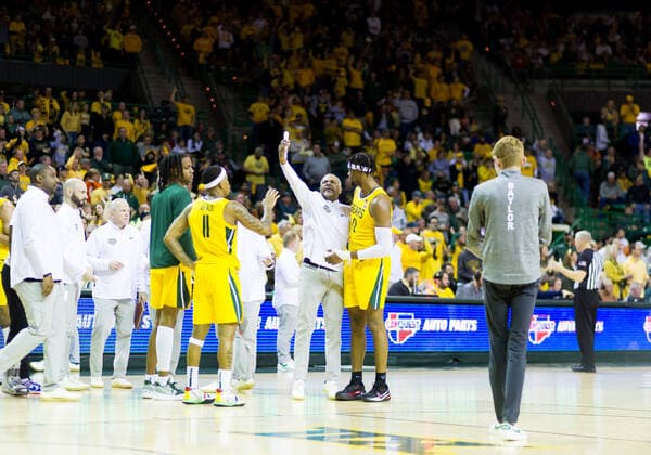 February 12 2022: Baylor Bears Associate Head Coach JEROME TANG coaches Baylor Bears forward Flo Thamba (0) during the 2nd half of the NCAA, College League, USA Basketball game between the Texas Longhorns and Baylor Bears at Ferrell Center in Waco, Texas. CSM Waco US - ZUMAc04_ 20220212_zaf_c04_116 Copyright: xMatthewxLynchx