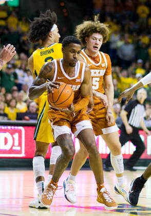 February 12 2022: Texas Longhorns guard Jase Febres (13) rebound the ball during the 2nd half of the NCAA, College League, USA Basketball game between the Texas Longhorns and Baylor Bears at Ferrell Center in Waco, Texas. CSM Waco US - ZUMAc04_ 20220212_zaf_c04_118 Copyright: xMatthewxLynchx