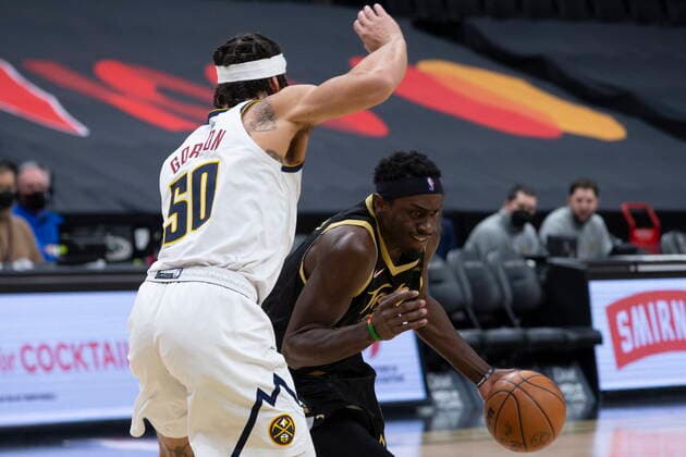 February 12, 2022, Toronto, ON, CANADA: Toronto Raptors Pascal Siakam (right) drives at Denver Nuggets Aaron Gordon during first half NBA, Basketball Herren, USA basketball action in Toronto on Saturday, February 12, 2022. Pascal Siakam; Aaron Gordon  - ZUMAc35_ 20220212_zaf_c35_269 Copyright: xChrisxYoungx