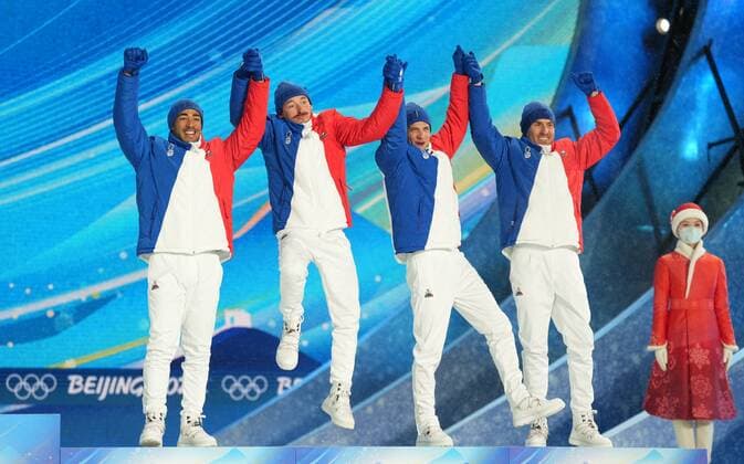 China Olympics 2022 Medal Ceremony 8113439 13.02.2022 Bronze medalists France?s Richard Jouve, Hugo Lapalus, Clement Parisse and Maurice Manificat celebrate during an award ceremony for the men s cross-country 4x10 km relay event during the Beijing 2022 Winter Olympic Games, Olympische Spiele, Olympia, OS at the Medals Plaza in Zhangjiakou, China. Pavel Bednyakov Sputnik Zhangjiakou China  Copyright: xPavelxBednyakovx