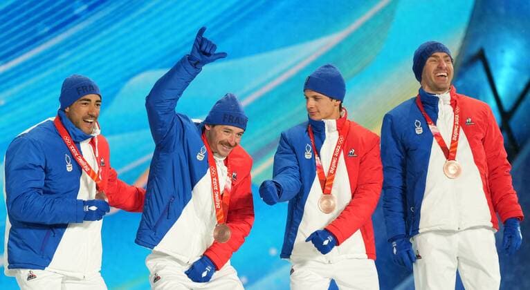 China Olympics 2022 Medal Ceremony 8113492 13.02.2022 Bronze medalists France?s Richard Jouve, Hugo Lapalus, Clement Parisse and Maurice Manificat celebrate during an award ceremony for the men s cross-country 4x10 km relay event during the Beijing 2022 Winter Olympic Games, Olympische Spiele, Olympia, OS at the Medals Plaza in Zhangjiakou, China. Pavel Bednyakov Sputnik Zhangjiakou China  Copyright: xPavelxBednyakovx
