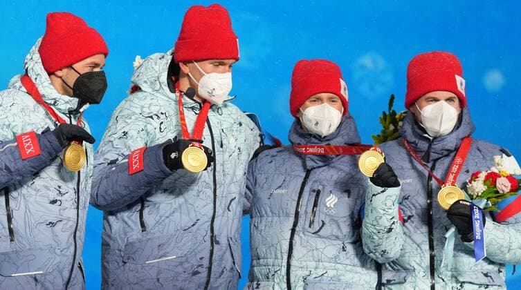 China Olympics 2022 Medal Ceremony 8113512 13.02.2022 From left, gold medalists Russian Olympic Committee s Alexey Chervotkin, Alexander Bolshunov, Denis Spitsov and Sergey Ustiugov celebrate their victory during an award ceremony for the men s cross-country 4x10 km relay event during the Beijing 2022 Winter Olympic Games, Olympische Spiele, Olympia, OS at the Medals Plaza in Zhangjiakou, China. Pavel Bednyakov Sputnik Zhangjiakou China  Copyright: xPavelxBednyakovx