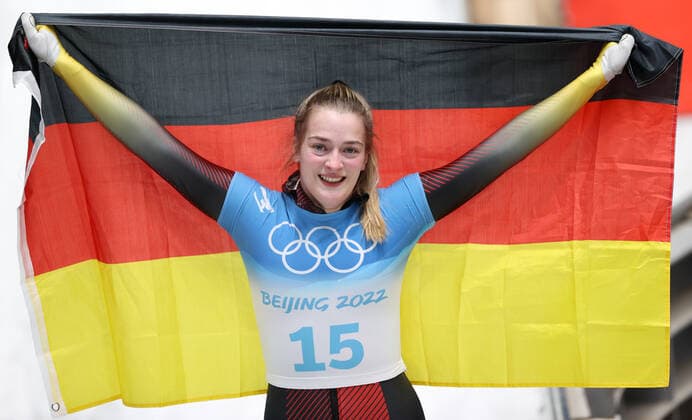 (220213) -- BEIJING, Feb. 12, 2022 -- Hannah Neise of Germany celebrates after winning the gold medal in the skeleton women heat of Beijing 2022 Winter Olympics at National Sliding Centre in Yanqing District, Beijing, capital of China, Feb. 12, 2022. ) (BEIJING2022)CHINA-BEIJING-OLYMPIC Winter games, Winterspiele,Spiele, Summer games SKELETON-WOMEN HEAT (CN) YaoxJianfeng 