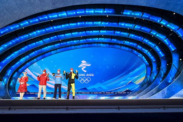 (220213) -- ZHANGJIAKOU, Feb. 13, 2022 -- Gold medalist Marius Lindvik (2nd R) of Norway, silver medalist Kobayashi Ryoyu (2nd L) of Japan and bronze medalist Karl Geiger (1st R) of Germany pose during the awarding ceremony of Ski jumping, Skispringen, Ski, nordisch men s large hill individual at Zhangjiakou Medals Plaza of the Winter Olympics in Zhangjiakou, north China s Hebei Province, Feb. 13, 2022. ) (BEIJING2022)CHINA- ZHANGJIAKOU-OLYMPIC Winter games, Winterspiele,Spiele, Summer games AWARDING CEREMONY (CN) FengxKaihua