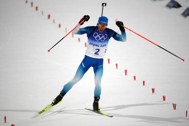 China Olympics 2022 Biathlon Men 8113592 13.02.2022 France s Quentin Fillon Maillet celebrates after winning the biathlon men s 12.5 km pursuit event of the Beijing 2022 Winter Olympic Games, Olympische Spiele, Olympia, OS at National Biathlon Centre in Zhangjiakou, China. Ramil Sitdikov Sputnik Zhangjiakou China  Copyright: xRamilxSitdikovx