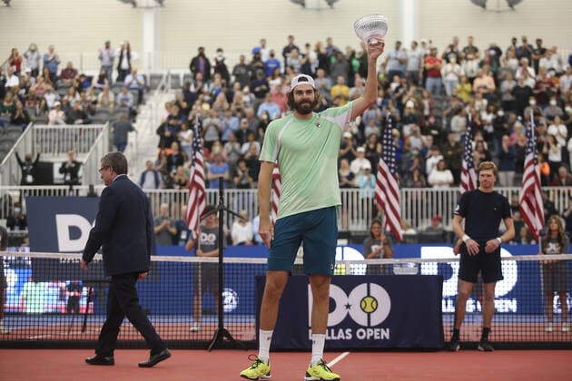 DALLAS, TX - FEBRUARY 13: Reilly Opelka (USA) poses with the trophy after winning the Dallas Open on February 13, 2022 at the Styslinger Altec Tennis Complex in Dallas, TX. (Photo by George Walker Icon Sportswire) TENNIS: FEB 13 Dallas Open Icon22021318
