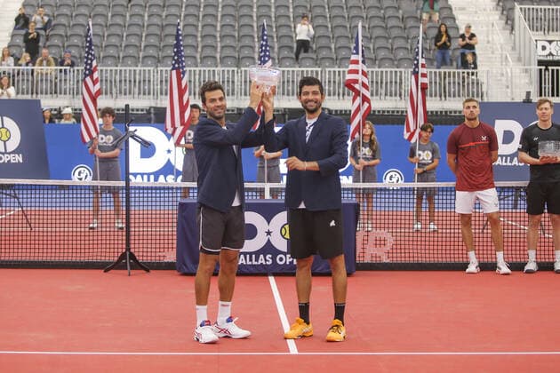 DALLAS, TX - FEBRUARY 13: Jean-Julien Rojer (NED) and Marcelo Arevalo (ESA) pose with the trophy after winning the Dallas Open on February 13, 2022 at the Styslinger Altec Tennis Complex in Dallas, TX. (Photo by George Walker Icon Sportswire) TENNIS: FEB 13 Dallas Open Icon22021332
