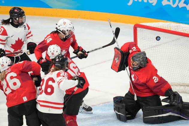 February 14, 2022, Beijing, ON, China: Canada forward Emily Clark (26) scores on Switzerland goaltender Saskia Maurer during second period women s Ice hockey, Eishockey semifinals action Monday, February 14, 2022 at the 2022 Winter Olympics in Beijing. Canada News - February 14, 2022  - ZUMAc35_ 20220214_zaf_c35_035 Copyright: xRyanxRemiorzx