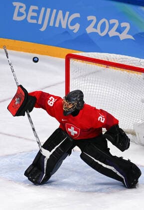 (220214) -- BEIJING, Feb. 14, 2022 -- Goalkeeper Saskia Maurer of Switzerland tries to make a save during the Ice hockey, Eishockey women s play-off semifinal between Canada and Switzerland at Wukesong Sports Centre in Beijing, capital of China, Feb. 14, 2022. ) (BEIJING2022)CHINA-BEIJING-OLYMPIC Winter games, Winterspiele,Spiele, Summer games ICE HOCKEY-WOMEN S PLAYOFF SEMIFINAL-CANADA VS SWITZERLAND (CN) LiuxXiao 