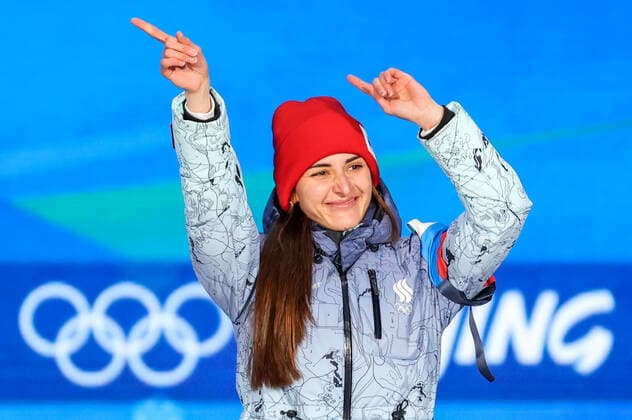 BEIJING, CHINA - FEBRUARY 14, 2022: Bronze medalist, ROC athlete Angelina Golikova attends an award ceremony for the women s 500m Speed skating, Eisschnelllauf event at the 2022 Winter Olympic Games, Olympische Spiele, Olympia, OS at the Medals Plaza. Anton Novoderezhkin TASS  TS123132