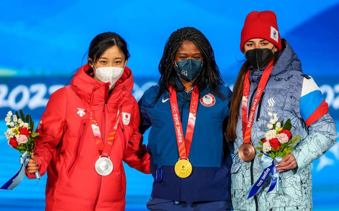 BEIJING, CHINA - FEBRUARY 14, 2022: Silver medalist, Miho Takagi of Japan, Gold medalist, Erin Jackson of the USA and Bronze medalist, ROC athlete Angelina Golikova (L-R) attend an award ceremony for the women s 500m Speed skating, Eisschnelllauf event at the 2022 Winter Olympic Games, Olympische Spiele, Olympia, OS at the Medals Plaza. Anton Novoderezhkin TASS TS12314A