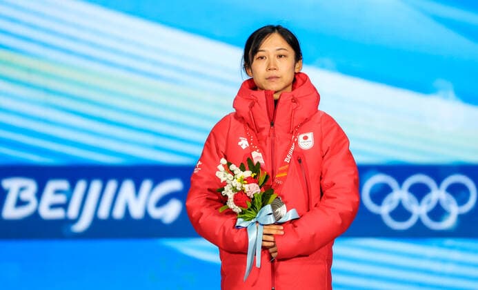 BEIJING, CHINA - FEBRUARY 14, 2022: Silver medalist, Miho Takagi of Japan attends an award ceremony for the women s 500m Speed skating, Eisschnelllauf event at the 2022 Winter Olympic Games, Olympische Spiele, Olympia, OS at the Medals Plaza. Anton Novoderezhkin TASS  TS12314C