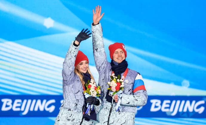 BEIJING, CHINA - FEBRUARY 14, 2022: Silver medalists, ROC athletes Victoria Sinitsina and Nikita Katsalapov attend an award ceremony for the ice dance event at the 2022 Winter Olympic Games, Olympische Spiele, Olympia, OS at the Medal Plaza. Anton Novoderezhkin TASS  TS123192