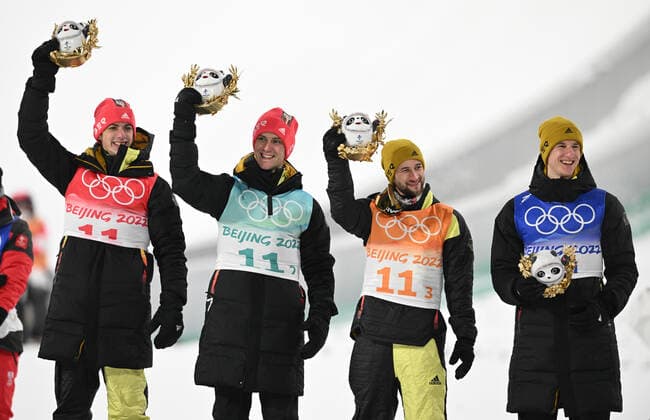 China Olympics 2022 Ski jumping, Skispringen, Ski, nordisch Men Team 8114640 14.02.2022 Bronze medalists Germany s Constantin Schmid, Stephan Leyhe, Markus Eisenbichler and Karl Geiger pose during the flower ceremony for the ski jumping men s team event during the Beijing 2022 Winter Olympic Games, Olympische Spiele, Olympia, OS at the National Ski Jumping Centre in Zhangjiakou, China. Alexey Filippov Sputnik Zhangjiakou China  Copyright: xAlexeyxFilippovx