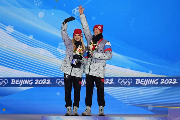 Silver medallists Victoria Sinitsina and Nikita Katsalapov of the Russian Olympic Committee wave during the medals ceremony for the Figure skating, Eiskunstlauf Ice Dance competition at the Beijing 2022 Winter Olympics on Monday, February 14, 2022.  OLY20220214335 PaulxHanna