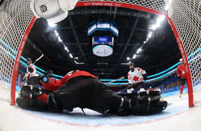 (220214) -- BEIJING, Feb. 14, 2022 -- Goalkeper Saskia Maurer (front) of Switzerland misses a goal during during the Ice hockey, Eishockey women s semifinal between Canada and Switzerland at Wukesong Sports Centre in Beijing, capital of China, Feb. 14, 2022. ) (BEIJING2022)CHINA-BEIJING-OLYMPIC Winter games, Winterspiele,Spiele, Summer games ICE HOCKEY-WOMEN S PLAYOFF SEMIFINAL-CAN VS SUI(CN) SongxYanhua 