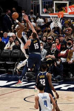 Denver Nuggets center Nikola Jokic (C-up) in action against Orlando Magic center Wendell Carter Jr (L), during a NBA, Basketball Herren, USA game at the Ball Arena in Denver, CO, USA, 14 February 2022. Orlando Magic at Denver Nuggets !ACHTUNG: NUR REDAKTIONELLE NUTZUNG!  Copyright: xToddxPiersonx AME5774 20220215-cb57fdc79494d1d1caa613a39403a01ecad5d66d