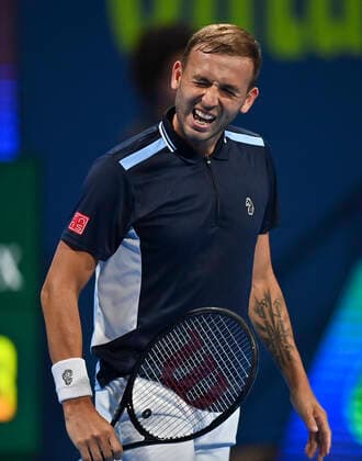 (220215) -- DOHA, Feb. 15, 2022 -- Dan Evans of Great Britain reacts during the first round of ATP, Tennis Herren Qatar Open tennis match against Egor Gerasimov of Belarus in Doha, capital of Qatar, Feb. 14, 2022. (Photo by Xinhua) (SP)QATAR-DOHA-TENNIS-ATP QATAR OPEN Nikku 