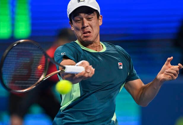 (220215) -- DOHA, Feb. 15, 2022 -- Mackenzie McDonald of the United States hits a return during the first round of ATP, Tennis Herren Qatar Open tennis match against Karen Khachanov of Russia in Doha, capital of Qatar, Feb. 14, 2022. (Photo by Xinhua) (SP)QATAR-DOHA-TENNIS-ATP QATAR OPEN Nikku 
