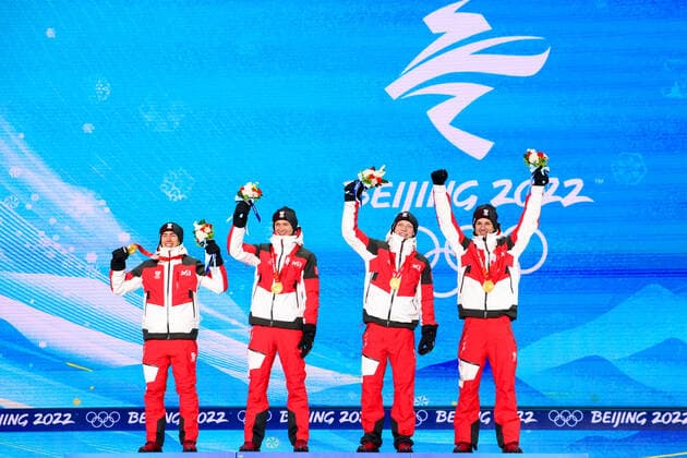 OLYMPICS - Winter Olympic Games, Olympische Spiele, Olympia, OS Beijing 2022 ZHANGJIAKOU,CHINA,15.FEB.22 - OLYMPICS, NORDIC SKIING, Ski jumping, Skispringen, Ski, nordisch - Winter Olympic Games Beijing 2022, large hill, men, team event, award ceremony. Image shows the rejoicing of Stefan Kraft, Daniel Huber, Jan Hoerl and Manuel Fettner (AUT). GEPAxpictures xMaticxKlansek
