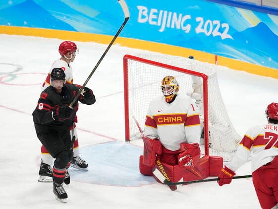 February 15, 2022, Beijing, China: Team Canada forward Eric Staal (12) celebrates a goal by teammate Adam Tabellini (not shown) past Team China goaltender Paris O Brien during second period men s qualification round hockey action at the Beijing Winter Olympics in Beijing, China, on Tuesday, Feb. 15, 2022. Canada News - February 15, 2022  - ZUMAc35_ 20220215_zaf_c35_120 Copyright: xRyanxRemiorzx