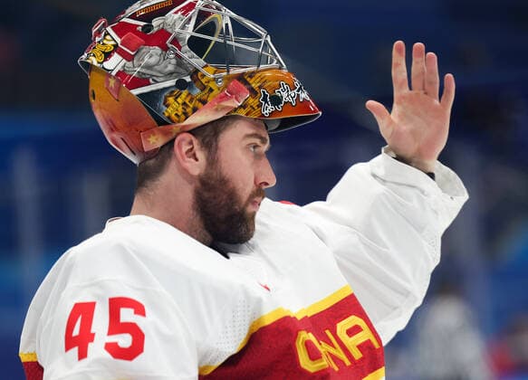 (220215) -- BEIJING, Feb. 15, 2022 -- Goalkeeper Shimisi Jieruimi of China reacts during the Ice hockey, Eishockey men s qualification play-off of Beijing 2022 Winter Olympics between Canada and China at Wukesong Sports Centre, in Beijing, capital of China, Feb. 15, 2022. ) (BEIJING2022)CHINA-BEIJING-OLYMPIC Winter games, Winterspiele,Spiele, Summer games ICE HOCKEY-MEN S QUALIFICATION PLAY-OFF-CAN VS CHN (CN) MengxYongmin