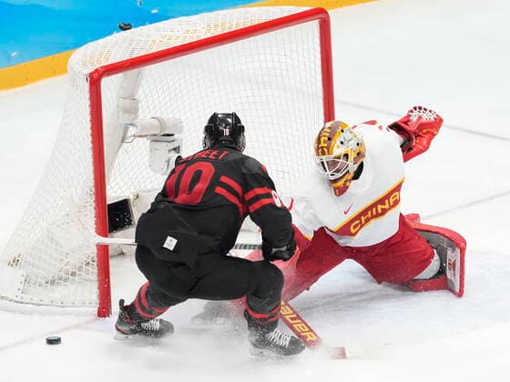 February 15, 2022, Beijing, China: Team Canada forward Ben Street (10) is stopped by Team China goaltender Paris O Brien (1) during third period men s qualification round hockey action at the Beijing Winter Olympics in Beijing, China, on Tuesday, Feb. 15, 2022. Canada News - February 15, 2022  - ZUMAc35_ 20220215_zaf_c35_125 Copyright: xRyanxRemiorzx