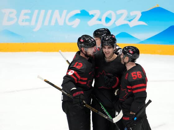 February 15, 2022, Beijing, China: Team Canada forward Jack McBain (11) celebrates his goal against China with teammates Eric Staal (12) and Maxim Noreau (56) during third period men s qualification round hockey action at the Beijing Winter Olympics in Beijing, China, on Tuesday, Feb. 15, 2022. Canada News - February 15, 2022  - ZUMAc35_ 20220215_zaf_c35_126 Copyright: xRyanxRemiorzx
