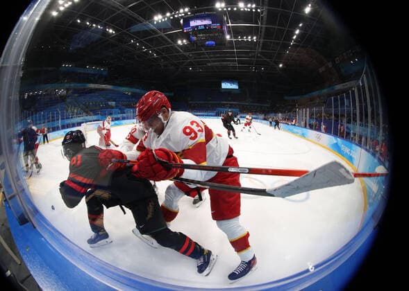 (220215) -- BEIJING, Feb. 15, 2022 -- Yuan Junjie (2nd L) of China competes during the Ice hockey, Eishockey men s qualification play-off of Beijing 2022 Winter Olympics between Canada and China at Wukesong Sports Centre, in Beijing, capital of China, Feb. 15, 2022. ) (BEIJING2022)CHINA-BEIJING-OLYMPIC Winter games, Winterspiele,Spiele, Summer games ICE HOCKEY-MEN S QUALIFICATION PLAY-OFF-CAN VS CHN (CN) MengxYongmin