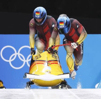 Beijing Olympics: Bobsleigh Germany s Francesco Friedrich (R) and Thorsten Margis start their third run in the two-man bobsleigh at the Beijing Winter Olympics on Feb. 15, 2022, at the National Sliding Centre in the Yanqing competition zone. They won gold.  A14AA0001247960P