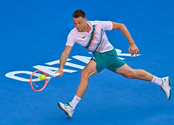 (220216) -- DOHA, Feb. 16, 2022 -- Jozef Kovalik of Slovakia returns the ball to Alexander Bublik of Kazakhstan during the first round of ATP, Tennis Herren Qatar Open Tennis match at the Khalifa International Tennis Complex in Doha, capital of Qatar, Feb. 15, 2022. (Photo by Xinhua) (SP)QATAR-DOHA Table tennis, Tischtennis ATP QATAR OPEN-FIRST ROUND Nikku 