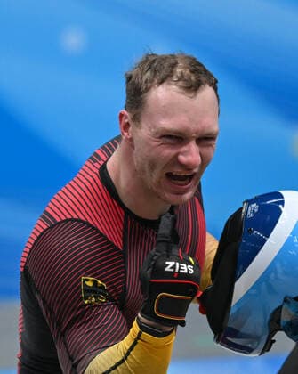 (220215) -- BEIJING, Feb. 15, 2022 -- Francesco Friedrich of Germany celebrates after the bobsleigh 2-man heat of Beijing 2022 Winter Olympics at National Sliding Centre in Yanqing District, Beijing, capital of China, Feb. 15, 2022. ) (BEIJING2022)CHINA-BEIJING-OLYMPIC Winter games, Winterspiele,Spiele, Summer games BOBSLEIGH-2-MEN-HEAT (CN) SunxFei 
