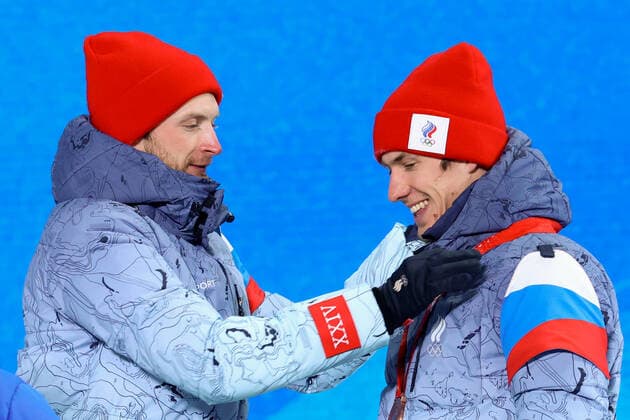 BEIJING 2022, Biathlon, 4x7,5km Staffel MÃ¤nner, Siegerehrung ZHANGJIAKOU, CHINA - FEBRUARY 16, 2022: ROC athletes Maxim Tsvetkov (L) and Eduard Latypov celebrate their bronze medals during the men s biathlon relay victory ceremony at the Medal Plaza as part of the 2022 Winter Olympic Games, Olympische Spiele, Olympia, OS Stanislav Krasilnikov TASS  TS12394F