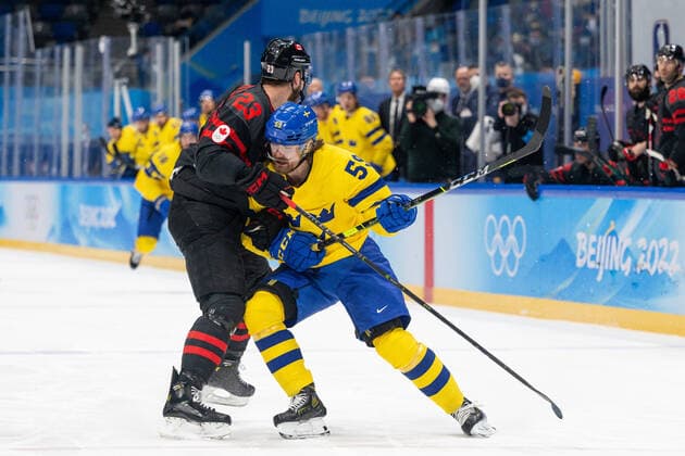 220216 Tyler Wotherspoon of Canada and Linus Johansson of Sweden in the men?s Ice hockey, Eishockey quarterfinal between Sweden and Canada during day 12 of the 2022 Winter Olympics on February 16, 2022 in Beijing. Photo: Maxim Thore BILDBYRAN kod MT MT0326 ishockey ice hockey Olympic Games, Olympische Spiele, Olympia, OS olympics winter olympics os ol olympiska spel vinter-os olympiske leker peking peking 2022 beijing 2022 beijing 2022 olympic games beijing 2022 winter olympic games peking-os beijing-ol vinter-ol 12 bbeng kvartsfinal sverige kanada Copyright: MAXIMxTHORE BB220216MT106