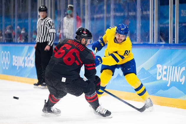 220216 Maxim Noreau of Canada and Theodor Lennström of Sweden in the men?s Ice hockey, Eishockey quarterfinal between Sweden and Canada during day 12 of the 2022 Winter Olympics on February 16, 2022 in Beijing. Photo: Maxim Thore BILDBYRAN kod MT MT0326 ishockey ice hockey Olympic Games, Olympische Spiele, Olympia, OS olympics winter olympics os ol olympiska spel vinter-os olympiske leker peking peking 2022 beijing 2022 beijing 2022 olympic games beijing 2022 winter olympic games peking-os beijing-ol vinter-ol 12 bbeng kvartsfinal sverige kanada Copyright: MAXIMxTHORE BB220216MT130